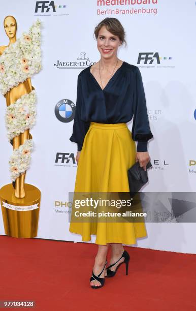 April 2018, Germany, Berlin, Palais am Funkturm venue: 68th German Film Prize, Lola, award, arrival: Actress Anneke Kim Sarnau. Photo: Britta...