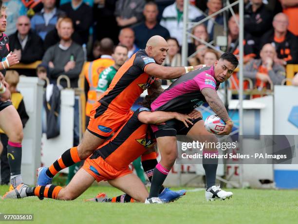 Hull KR's Junior Vaivai looks to off load during the Betfred Super League match at the Mend-A-Hose Jungle, Casteford.