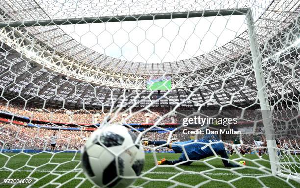 Hirving Lozano of Mexico scores his team's first goal past Manuel Neuer of Germany during the 2018 FIFA World Cup Russia group F match between...