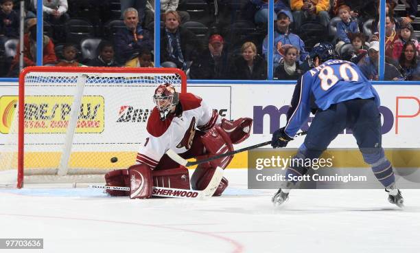 Jason LaBarbera of the Phoenix Coyotes makes a save in the shootout against Nik Antropov of the Atlanta Thrashers at Philips Arena on March 14, 2010...
