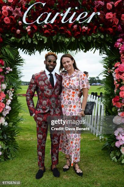 Tinie Tempah and Caroline Rush attend the Cartier Queen's Cup Polo Final at Guards Polo Club on June 17, 2018 in Egham, England.