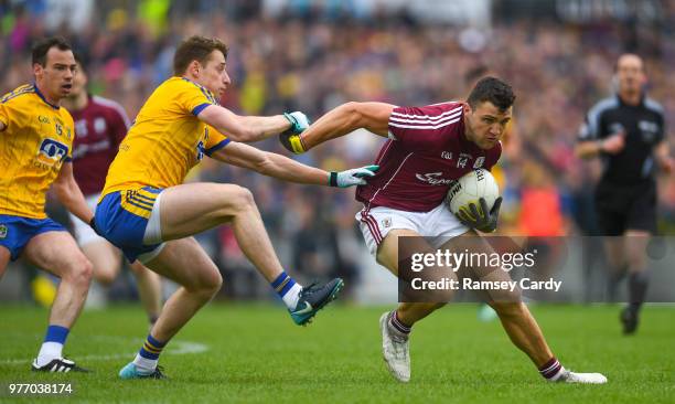 Roscommon , Ireland - 17 June 2018; Damien Comer of Galway in action against Niall McInerney of Roscommon during the Connacht GAA Football Senior...