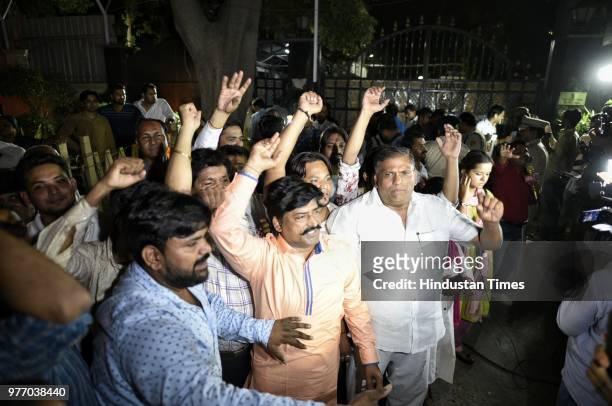 Supporters gather outside CM Kejriwal's residence as West Bengal CM arrived to visit his family members and later addressed a press conferenxce, on...
