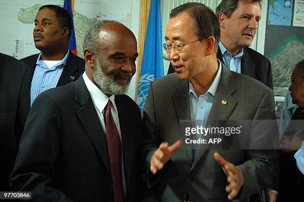 Secretary General Ban Ki-moon discusses with Haitian President René Préval after giving a joint news conference in Haiti's capital Port-au-Prince on...