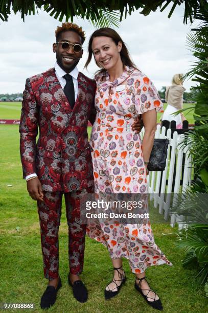 Tinie Tempah and Caroline Rush attend the Cartier Queen's Cup Polo Final at Guards Polo Club on June 17, 2018 in Egham, England.