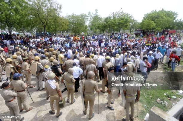 Residents and villagers during a protest march against dumping ground at Sector 123, on June 17, 2018 in Noida, India. The National Green Tribunal...