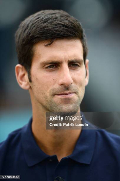 Novak Djokovic of Serbia speak to the media during qualifying Day 2 of the Fever-Tree Championships at Queens Club on June 17, 2018 in London, United...