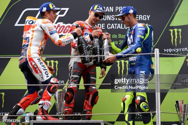 Marc Marquez of Spain and Repsol Honda Team, Jorge Lorenzo of Spain and Ducati Team, Valentino Rossi of Italy and Movistar Yamaha MotoGP during the...