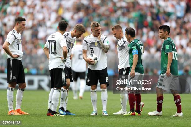 Julian Draxler, Mesut Oezil, Thomas Mueller, Toni Kroos and Joshua Kimmich look on during the 2018 FIFA World Cup Russia group F match between...