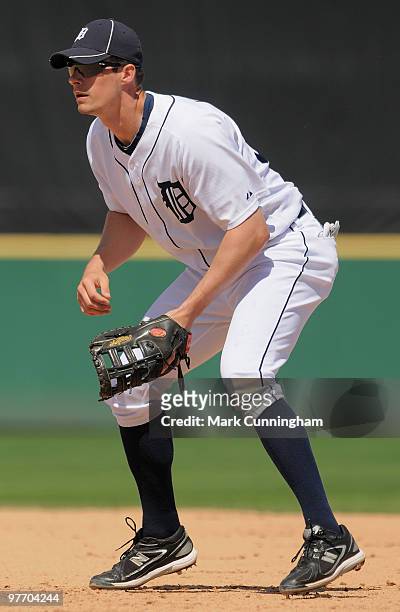 Don Kelly of the Detroit Tigers fields against the Tampa Bay Rays during the spring training game at Joker Marchant Stadium on March 14, 2010 in...