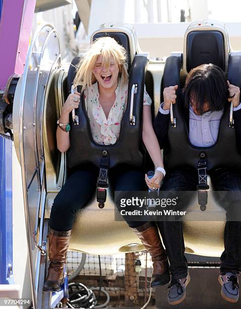 Actress Mischa Barton attends the Make-A-Wish Foundation event hosted by Kevin and Steffiana James at the Santa Monica Pier on March 14, 2010 in...