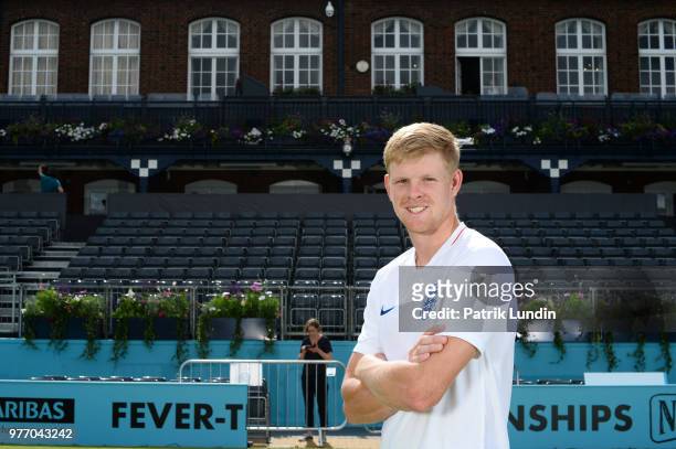 Kyle Edmund of Great Britain wearing an England shirt in support of the World Cup team during qualifying Day 2 of the Fever-Tree Championships at...
