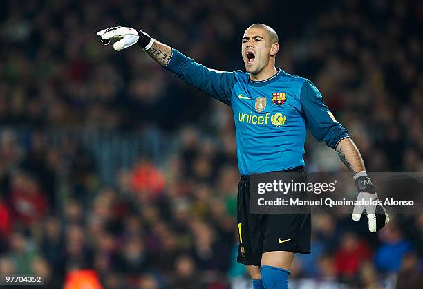 Victor Valdes of FC Barcelona gives instructions during the La Liga match between Barcelona and Valencia at the Camp Nou Stadium on March 14, 2010 in...