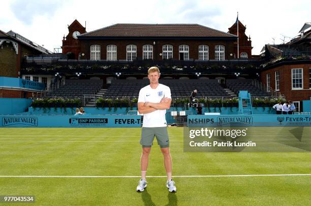 Kyle Edmund of Great Britain wearing an England shirt in support of the World Cup team during qualifying Day 2 of the Fever-Tree Championships at...