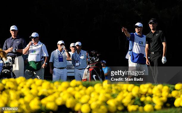 Charl Schwartzel of South Africa prepares to hit from the 15th tee box during the final round of the World Golf Championships-CA Championship at...