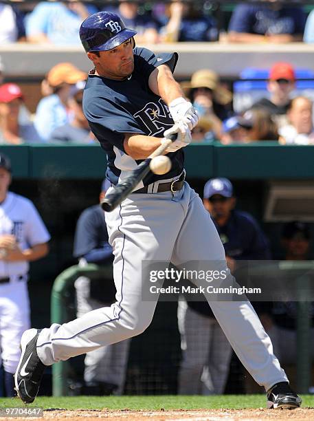 Pat Burrell of the Tampa Bay Rays bats against the Detroit Tigers during a spring training game at Joker Marchant Stadium on March 14, 2010 in...