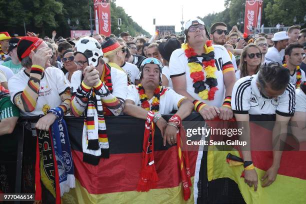 Germany fans react to play at the Fanmeile public viewing area during the Germany vs. Mexico 2018 FIFA World Cup match on June 17, 2018 in Berlin,...