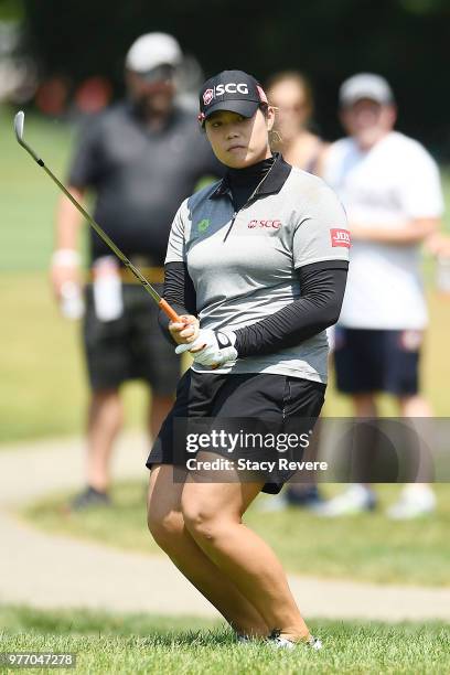 Ariya Jutanugarn of Thailand chips to the 18th green during the final round of the Meijer LPGA Classic for Simply Give at Blythefield Country Club on...