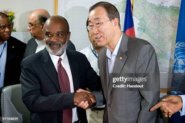 In this handout image provided by the United Nations Stabilization Mission in Haiti , UN Secretary General Ban Ki-moon and Haitian President Rene...