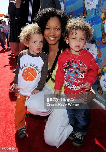 Actress Garcelle Beauvais and her sons Jaid and Jax arrive at the Make-A-Wish Foundation event hosted by Kevin and Steffiana James at the Santa...
