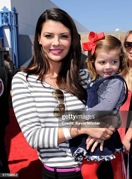 Actress Ali Landry and her daughter Estela Monteverde arrive at the Make-A-Wish Foundation event hosted by Kevin and Steffiana James at the Santa...