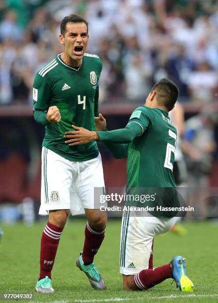 Hugo Ayala of Mexico celebrates with team mate Rafael Marquez following his sides victory in the 2018 FIFA World Cup Russia group F match between...