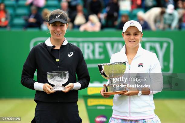 Ashleigh Barty of Australia celebrates victory with runner up Johanna Konta of Great Britain in the Womens Singles Final during Day Nine of the...