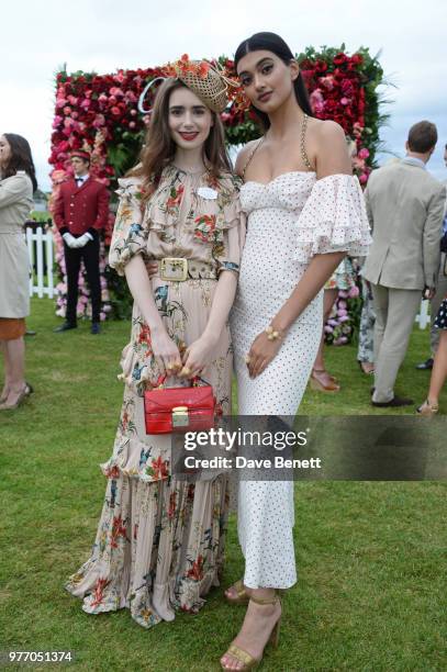 Lily Collins and Neelam Gill attend the Cartier Queen's Cup Polo Final at Guards Polo Club on June 17, 2018 in Egham, England.