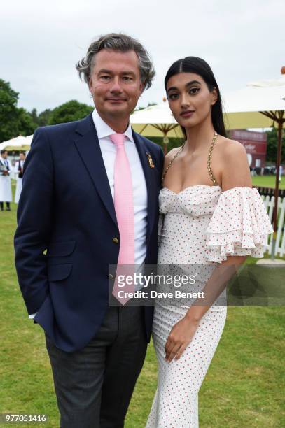 Laurent Feniou and Neelam Gill attend the Cartier Queen's Cup Polo Final at Guards Polo Club on June 17, 2018 in Egham, England.