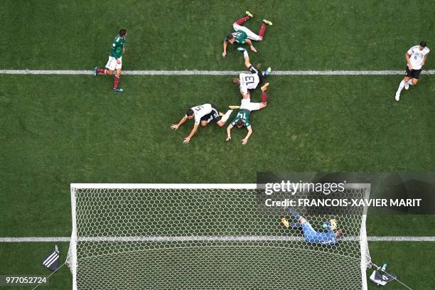 Germany's goalkeeper Manuel Neuer makes a save during the Russia 2018 World Cup Group F football match between Germany and Mexico at the Luzhniki...