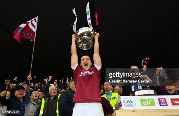 Roscommon , Ireland - 17 June 2018; Galway captain Damien Comer lifts the cup following their victory in the Connacht GAA Football Senior...