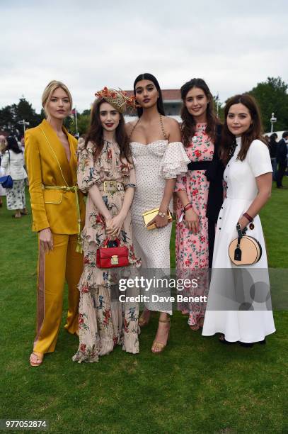 Martha Hunt, Lily Collins, Neelam Gill, a guest and Jenna Coleman attend the Cartier Queen's Cup Polo at Guards Polo Club on June 17, 2018 in Egham,...