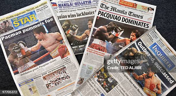 Philippines newpapers headline with the news of the welterweight bout between Philippines boxing superstar Manny Pacquiao and Joshua Clottey of...