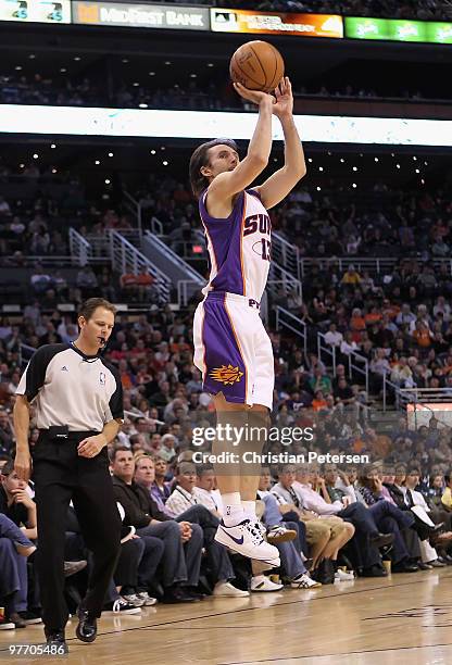 Steve Nash of the Phoenix Suns puts up a three point shot against the New Orleans Hornets during the NBA game at US Airways Center on March 14, 2010...