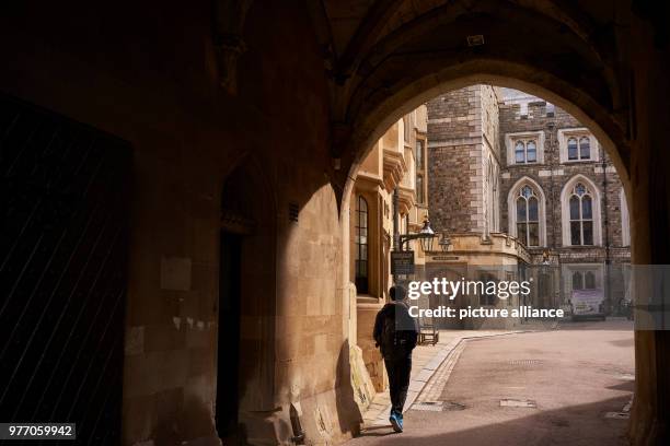 April 2018, Windsor, Great Britain: A visitor walking on the premises of the Windsor palace. Prince Harry and American Actress Meghan Markle will be...