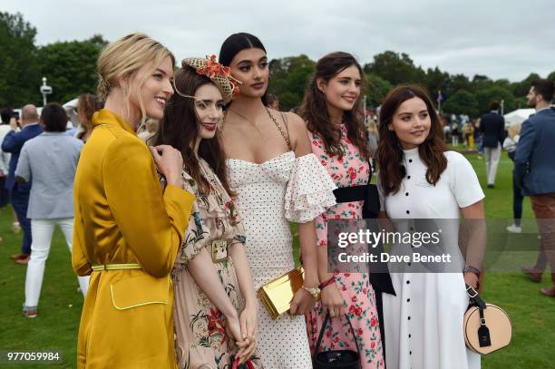 Martha Hunt, Lily Collins, Neelam Gill, a guest and Jenna Coleman attend the Cartier Queen's Cup Polo at Guards Polo Club on June 17, 2018 in Egham,...