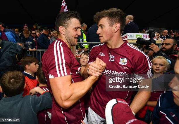 Roscommon , Ireland - 17 June 2018; Damien Comer, left, and Shane Walsh of Galway following the Connacht GAA Football Senior Championship Final match...