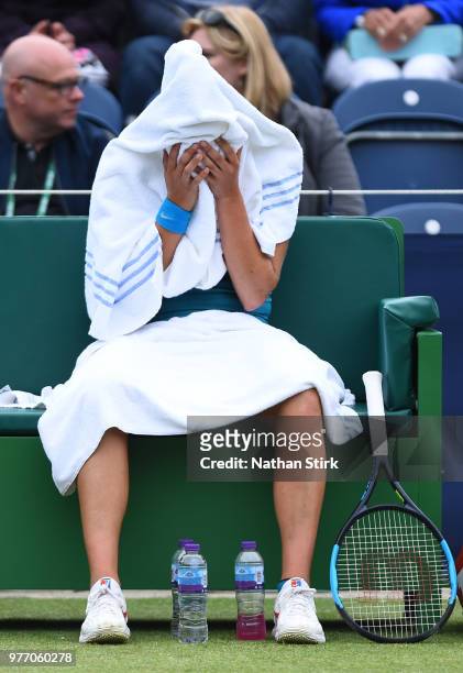 Sara Sorribes Tormo of Spain covers her face during a break in the Womens Singles Final during Finals Day of the Fuzion 100 Manchester Trophy at The...