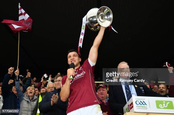 Roscommon , Ireland - 17 June 2018; Galway captain Damien Comer lifts the cup following their victory in the Connacht GAA Football Senior...