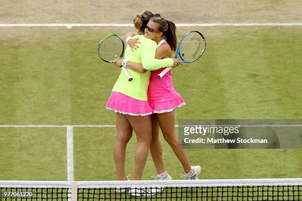 Abigail Spears of the United States and Alicja Rosolska of Poland crelbrate match point during their women's doubles final match against Heather...
