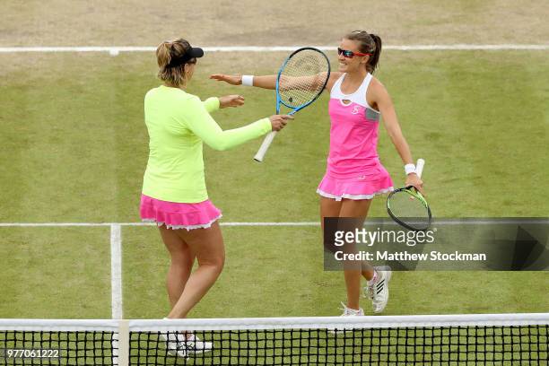 Abigail Spears of the United States and Alicja Rosolska of Poland crelbrate match point during their women's doubles final match against Heather...