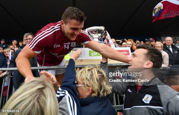 Roscommon , Ireland - 17 June 2018; Galway captain Damien Comer is congratulated by his mother Marie, sister Nicola and brother Jonathan following...