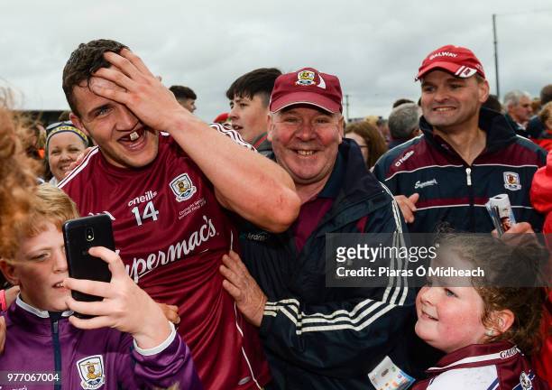 Roscommon , Ireland - 17 June 2018; Galway captain Damien Comer celebrates with supporters after the Connacht GAA Football Senior Championship Final...
