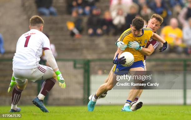 Roscommon , Ireland - 17 June 2018; Diarmuid Murtagh of Roscommon is tackled by Eoghan Kerin of Galway during the Connacht GAA Football Senior...