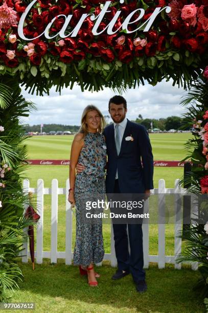 Caroline Rupert and Hickman Bacon attend the Cartier Queen's Cup Polo Final at Guards Polo Club on June 17, 2018 in Egham, England.