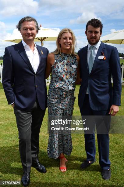 Laurent Feniou, Caroline Rupert and Hickman Bacon attend the Cartier Queen's Cup Polo Final at Guards Polo Club on June 17, 2018 in Egham, England.