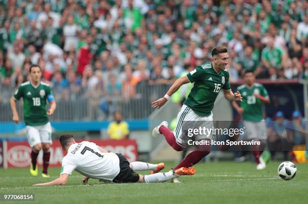 Midfielder Julian Draxler of Germany and defender Hector Herrera of Mexico during a Group F 2018 FIFA World Cup soccer match between Germany and...