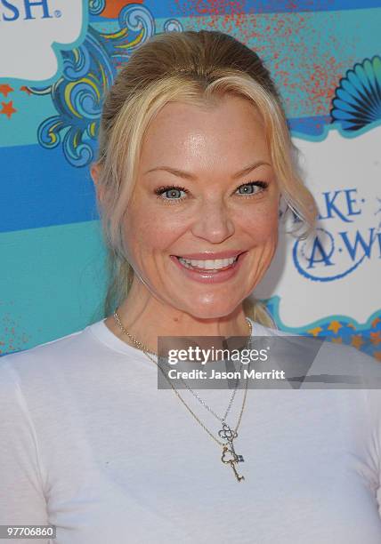 Actress Charlotte Ross arrives at the Make A Wish Foundation event hosted by Kevin and Steffiana James at Santa Monica Pier on March 14, 2010 in...