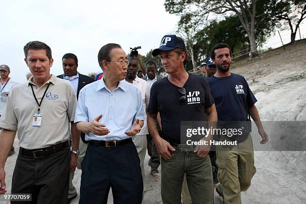 In this handout image provided by the United Nations Stabilization Mission in Haiti , The Secretary-General of the United Nations, Ban Ki-Moon, and...