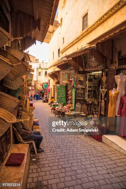 moroccan street - djellaba stock pictures, royalty-free photos & images